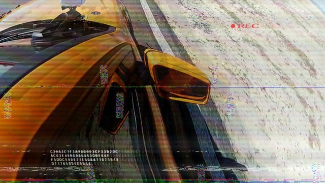 Video Reference: sports car, yellow car, car close-up, side mirror, parked vehicle, curb, road, vehicle exterior, automotive, driving footage, dashcam, glitch, noise, REC indicator