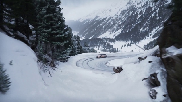 Video Reference: Snow, Mountain, Sky, Automotive tire, Tree, Slope, Plant, Highland, Cloud, Outdoor recreation