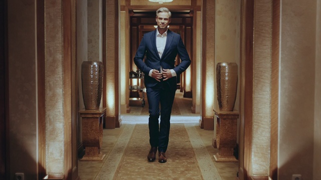 Video Reference: Shoe, Door, Textile, Sleeve, Dress shirt, Collar, Waist, Wood, Fashion design, Blazer