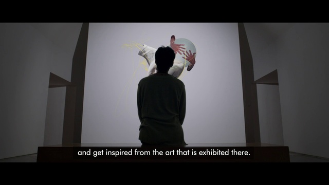 Video Reference: Flash photography, Sleeve, Font, Fashion design, Display device, Event, Art, Presentation, Darkness, Entertainment