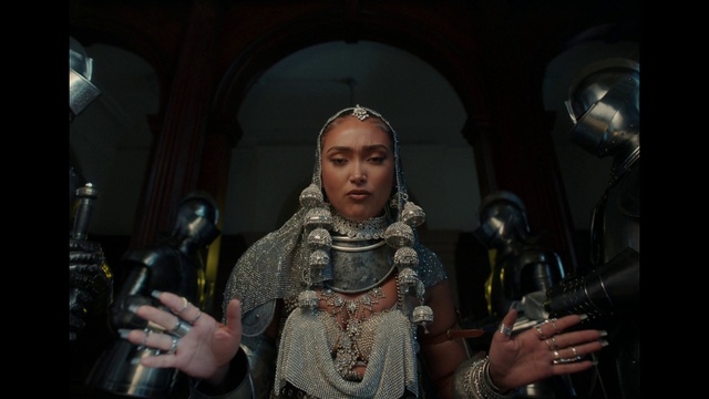 Video Reference: Microphone, Entertainment, Armour, Necklace, Performing arts, Jewellery, Fashion design, Event, Glove, Fun