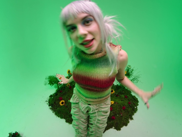 Video Reference: Entertainment, Performing arts, Happy, Glove, Wig, Fashion design, Fun, Fictional character, Event, Necklace