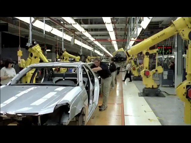 Video Reference: car factory, assembly line, robotic arms, manufacturing, automobile, industrial, factory, vehicle body, production, worker, engineering, automation, machinery, assembly, inspector