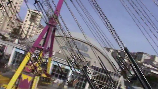 Video Reference: Sky, Wheel, Ferris wheel, Outdoor recreation, Recreation, Automotive wheel system, Amusement ride, Leisure, Event, Pole