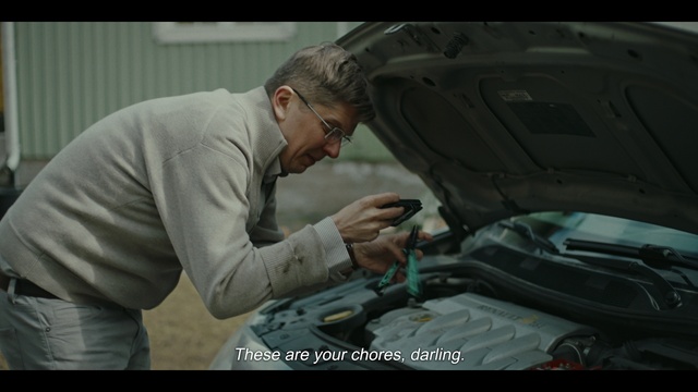 Video Reference: Hood, Automotive tire, Vehicle, Motor vehicle, Automotive design, Gesture, Car, Mechanic, Automotive lighting, Workwear