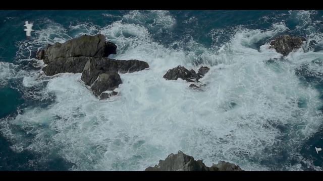 Video Reference: Water, Natural landscape, Sky, Coastal and oceanic landforms, Watercourse, Terrain, Wind wave, Headland, Bedrock, Cloud
