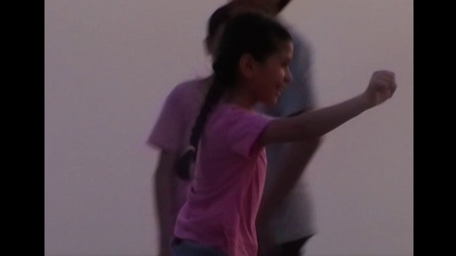 Video Reference: Purple, Sleeve, Gesture, Violet, Elbow, Magenta, Wrist, Event, T-shirt, Balance