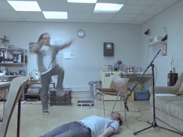 Video Reference: Shoulder, Leg, Flooring, Building, Table, Knee, Comfort, Service, Clock, Bookcase