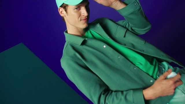 Video Reference: Hand, Arm, Hat, Sleeve, Flash photography, Gesture, Smile, Collar, Finger, Elbow