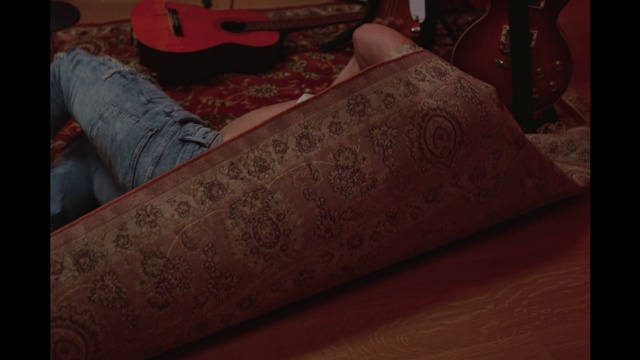 Video Reference: Guitar accessory, Wood, Musical instrument, Flooring, Guitar, Human leg, Pattern, Plucked string instruments, Comfort, Hardwood