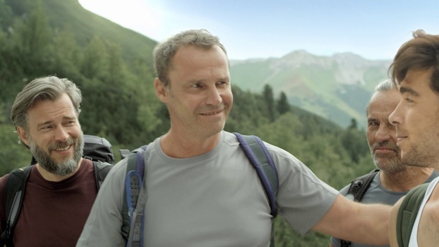 Video Reference: Hair, Head, Smile, Sky, Mountain, Muscle, Natural environment, Happy, T-shirt, Travel