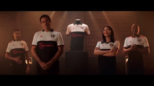 Video Reference: Shirt, Sleeve, T-shirt, Font, Sports uniform, Entertainment, Performing arts, Shorts, Event, Fun