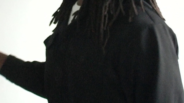 Video Reference: Neck, Sleeve, Gesture, Long hair, Fashion design, Street fashion, Fur, Fashion accessory, Wood, Grass