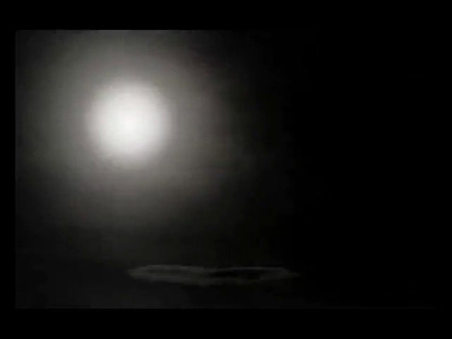 Video Reference: dark, blurred, light, glow, abstract, low-light, night, indistinct, out-of-focus, black-background