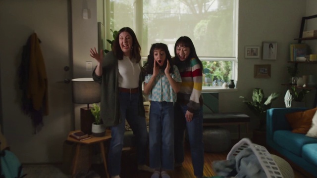 Video Reference: Smile, Plant, Gesture, Living room, Happy, Houseplant, Picture frame, Fun, Event, Shorts