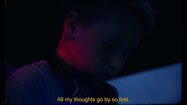 Video Reference: Nose, Flash photography, Jaw, Ear, Audio equipment, Eyelash, Entertainment, Electric blue, T-shirt, Magenta