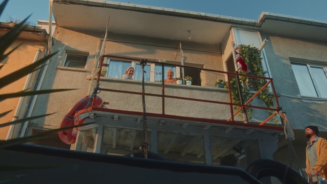 Video Reference: Building, Sky, Window, House, Urban design, Facade, Commercial building, Shade, Leisure, Siding