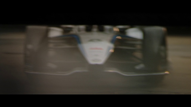 Video Reference: Automotive lighting, Automotive design, Font, Tints and shades, Electric blue, Darkness, Carmine, Auto part, Automotive exterior, Symbol
