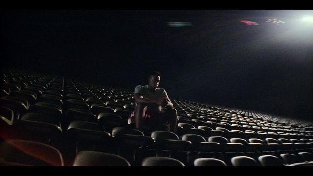 Video Reference: Human body, Chair, Entertainment, Movie theater, Musical instrument accessory, Event, Performing arts center, Building, Public speaking, Audience