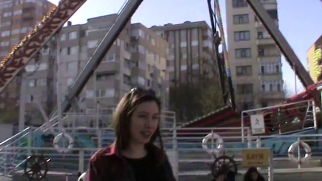 Video Reference: Sky, Building, Window, Travel, Leisure, City, Tree, Street fashion, Fun, Urban area