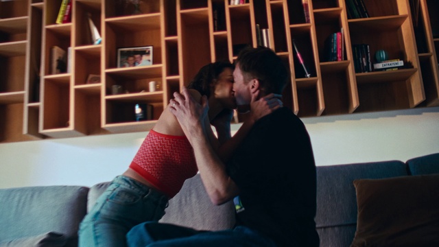 Video Reference: Clothing, Flash photography, Comfort, Gesture, Interaction, Fun, Couch, Event, T-shirt, Room