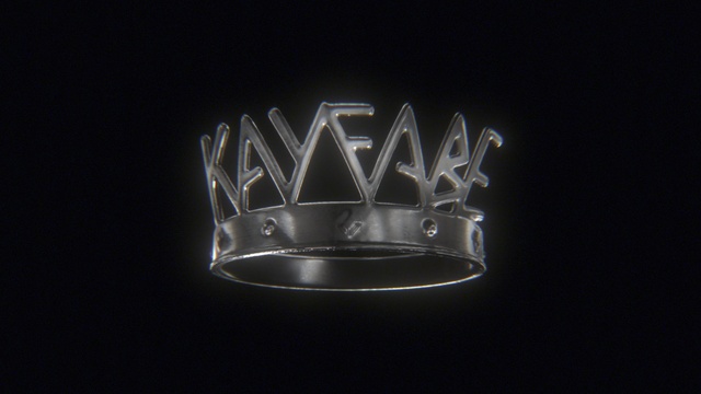 Video Reference: Automotive design, Font, Metal, Logo, Circle, Fashion accessory, Graphics, Crown, Symbol, Darkness