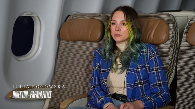 Video Reference: Comfort, Air travel, Travel, Automotive design, Thigh, Long hair, Electric blue, Chair, Blond, Human leg