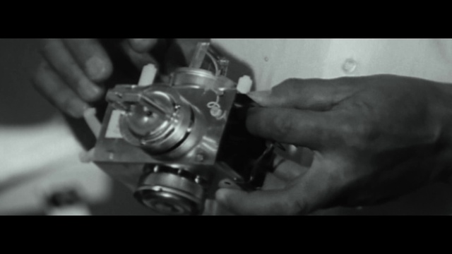 Video Reference: Hand, Flash photography, Gesture, Finger, Font, Machine, Nail, Engineering, Mechanic, Cameras & optics