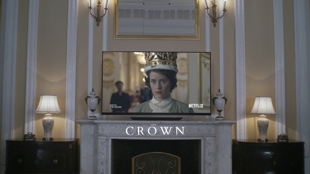 Video Reference: Lighting, Picture frame, Lamp, Suit, Podium, Event, Formal wear, Official, Room, Curtain