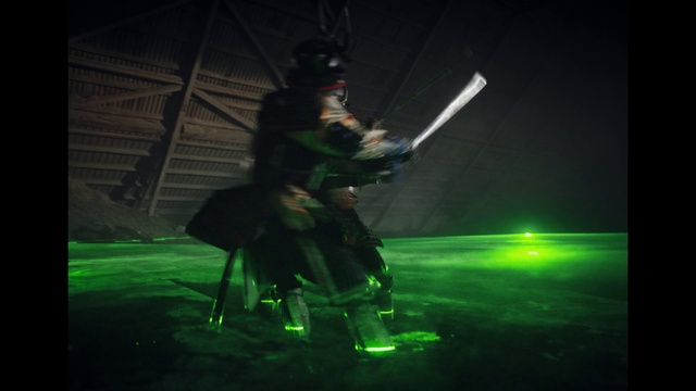 Video Reference: Green, Flash photography, Art, Darkness, Event, Fictional character, Entertainment, Graphics, Graphic design, Animation