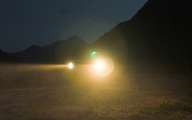 Video Reference: Atmosphere, Automotive lighting, Sky, Mountain, Headlamp, Vehicle, Asphalt, Astronomical object, Mountainous landforms, Landscape