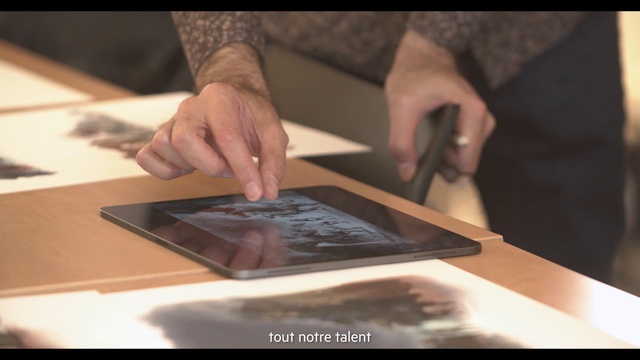 Video Reference: Brown, Hand, Table, Tablet computer, Gadget, Gesture, Wood, Finger, Nail, Automotive design