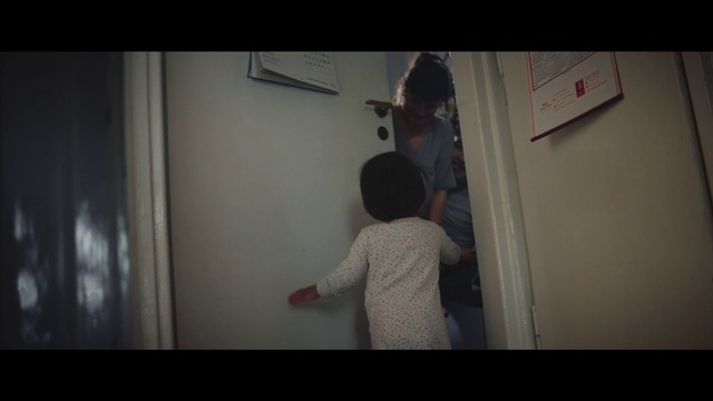 Video Reference: Flash photography, Gesture, Elbow, Tints and shades, Flooring, Font, Darkness, Visual arts, Toddler, Magenta