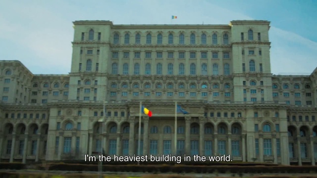 Video Reference: Building, Sky, Window, City, Facade, Condominium, Tower block, House, Metropolitan area, Commercial building