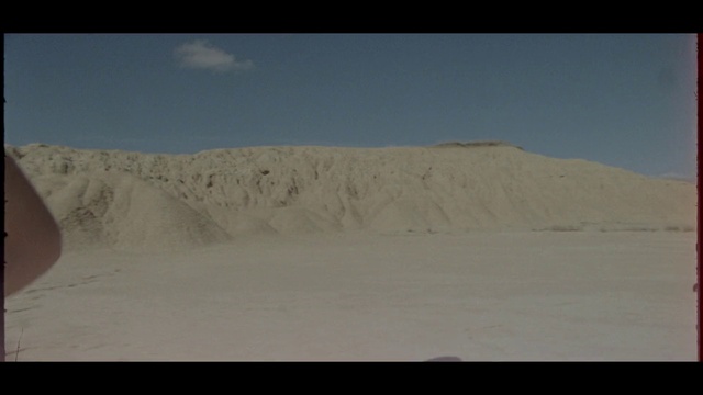 Video Reference: Sky, Cloud, Slope, Terrain, Tints and shades, Landscape, Aeolian landform, Horizon, Formation, Singing sand