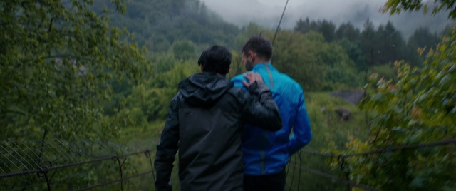 Video Reference: Plant, Mountain, Sky, Highland, Natural landscape, Gesture, Atmospheric phenomenon, Tree, Landscape, Jacket