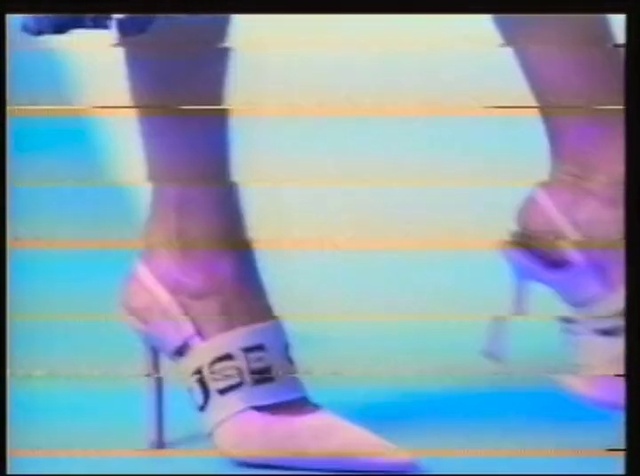 Video Reference: Footwear, Shoulder, Shorts, Leg, Human body, Knee, Dress, Thigh, Sportswear, Waist