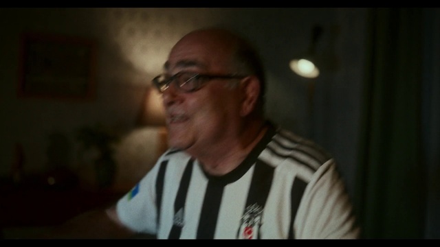 Video Reference: Glasses, Vision care, Jaw, Flash photography, Sleeve, Smile, Eyewear, Facial hair, T-shirt, Event