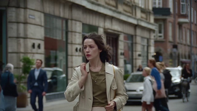 Video Reference: Car, Building, Sleeve, Eyewear, Gesture, City, Blazer, Road, Travel, Waist