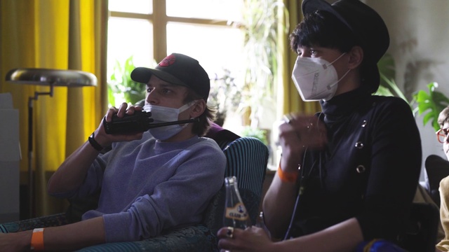 Video Reference: Vision care, Human, Cap, Purple, Eyewear, Headgear, Fun, Baseball cap, Drink, Musician