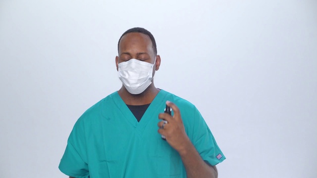 Video Reference: Sleeve, Gesture, Medical, Scrubs, Health care provider, Hearing, Service, T-shirt, Electric blue, Workwear