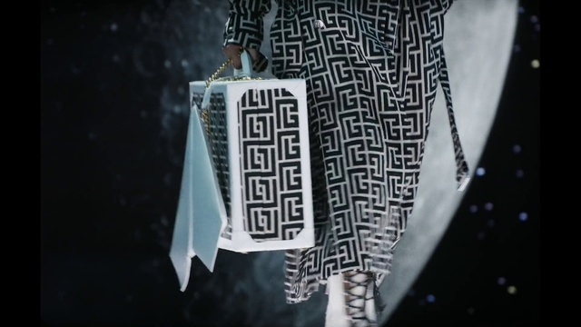 Video Reference: Textile, Sleeve, Grey, Style, Black-and-white, Font, Street fashion, Jewellery, Waist, Pattern