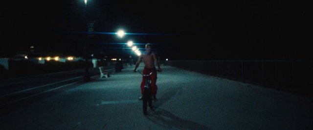 Video Reference: Bicycle, Automotive lighting, Bicycle wheel, Street light, Road surface, Asphalt, Tire, Headlamp, Midnight, Wheel