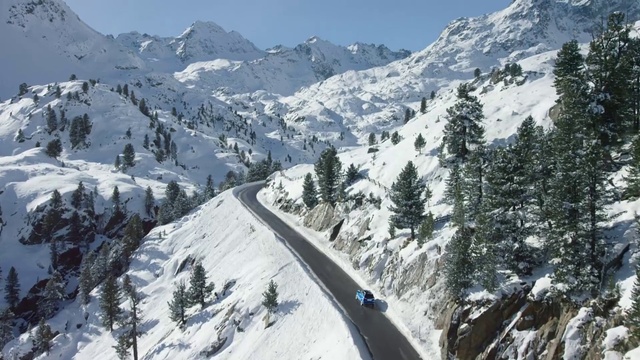 Video Reference: Sky, Snow, Mountain, Cloud, Slope, Tree, Highland, Outdoor recreation, Terrain, Freezing