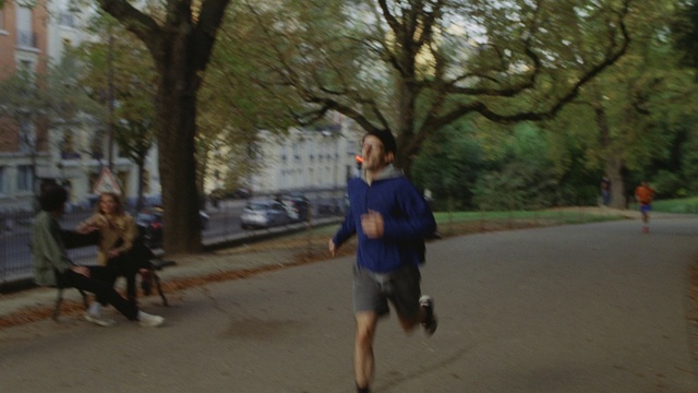 Video Reference: Shorts, Tree, Plant, Outdoor recreation, Atmospheric phenomenon, Asphalt, Leisure, Exercise, Recreation, Athlete