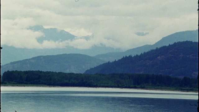 Video Reference: Cloud, Water, Sky, Mountain, Natural landscape, Fluvial landforms of streams, Lake, Watercourse, Tree, Coastal and oceanic landforms