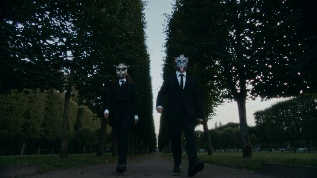 Video Reference: Sky, Plant, Tree, Coat, Gesture, Suit, Grass, Blazer, Overcoat, Tints and shades