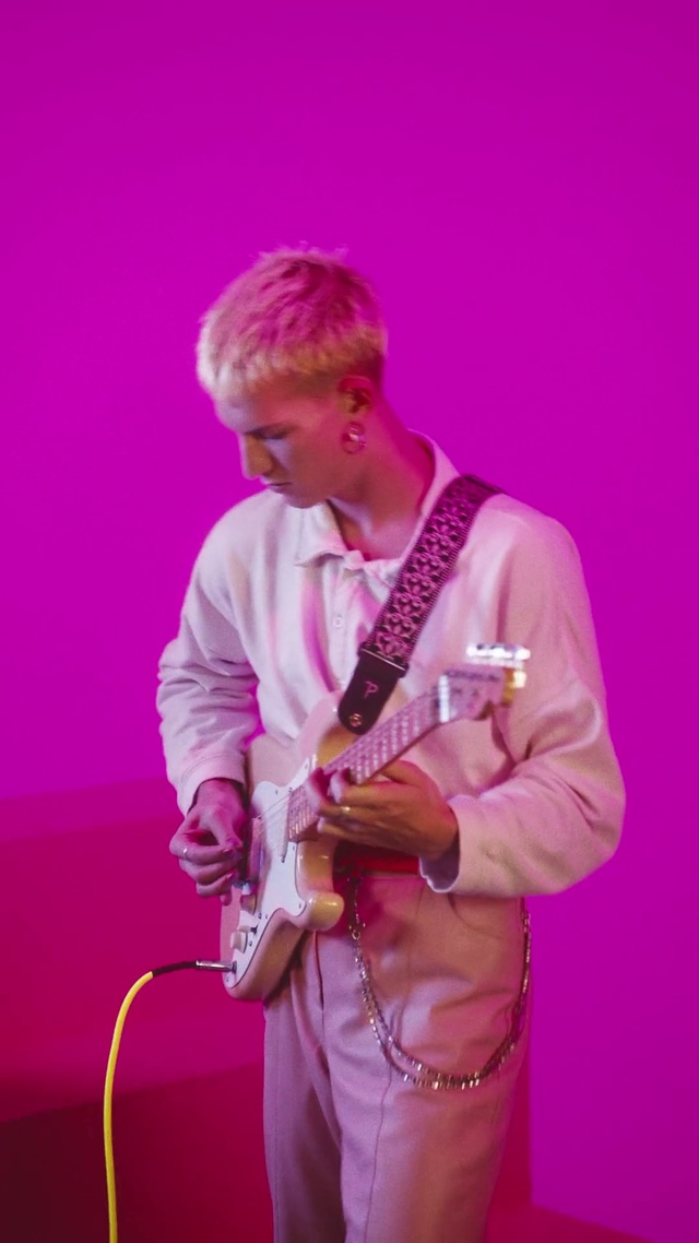 Video Reference: Musical instrument, Arm, Guitar, String instrument, Plant, String instrument, Purple, Guitar accessory, Human body, String instrument accessory