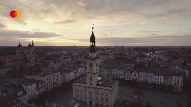 Video Reference: Cloud, Sky, Building, Light, Window, Tower, Dusk, Sunlight, Atmospheric phenomenon, Cityscape