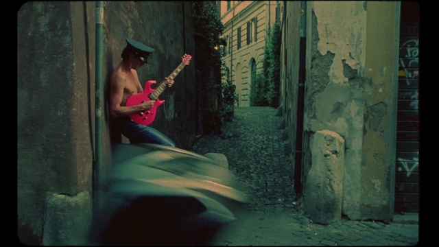 Video Reference: Guitar, Musical instrument, Flash photography, Musician, Plucked string instruments, Art, String instrument, Guitarist, Tints and shades, Music